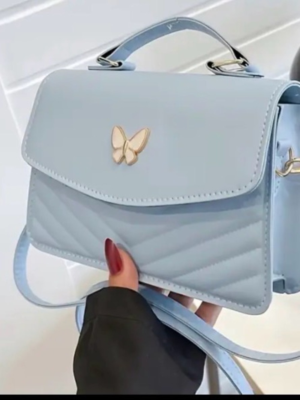 Elegant Light Blue Butterfly Accent Top-Handle Crossbody Bag